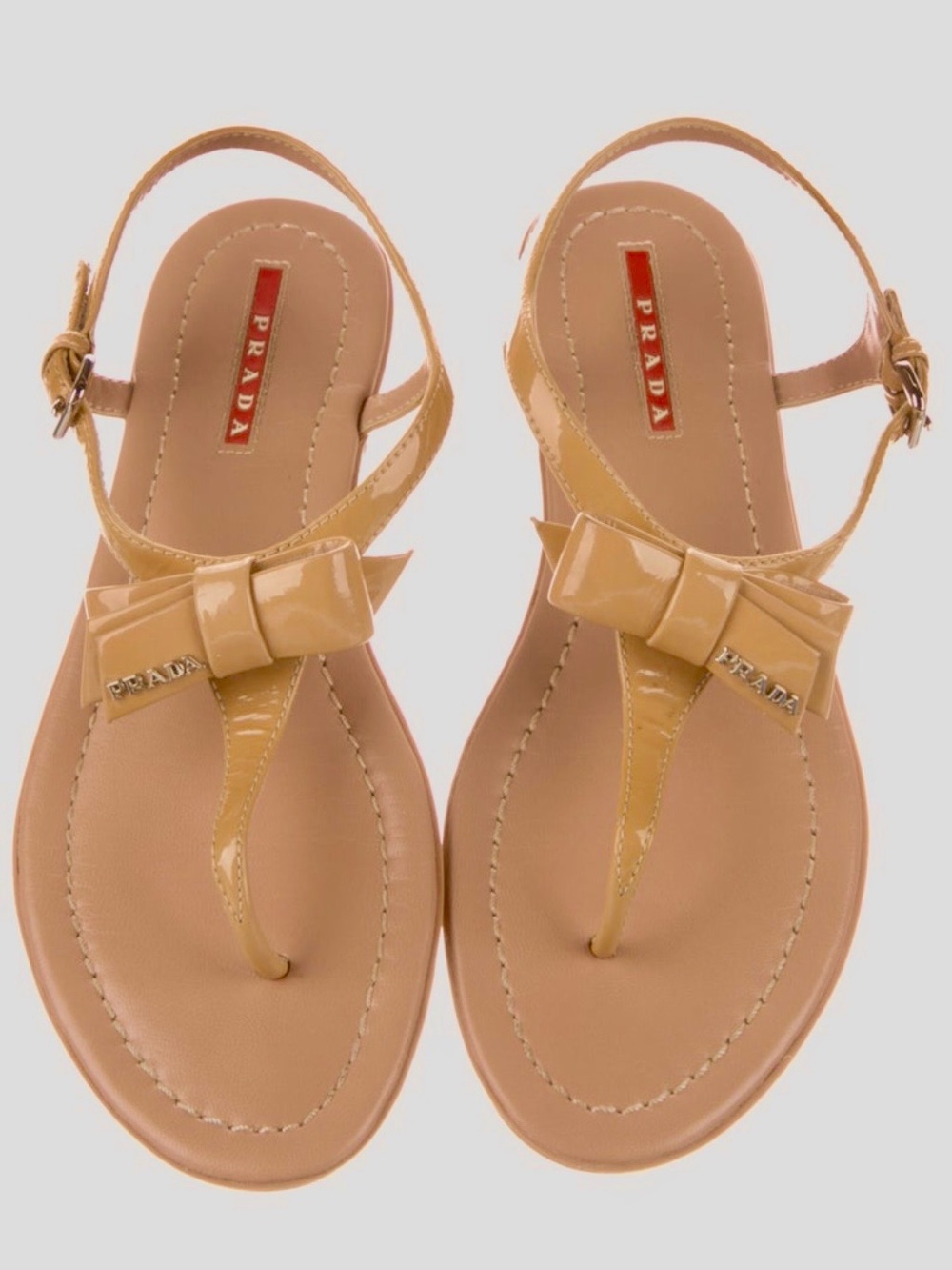 Prada Patent Leather Bow Thong Sandals in Tan size 8